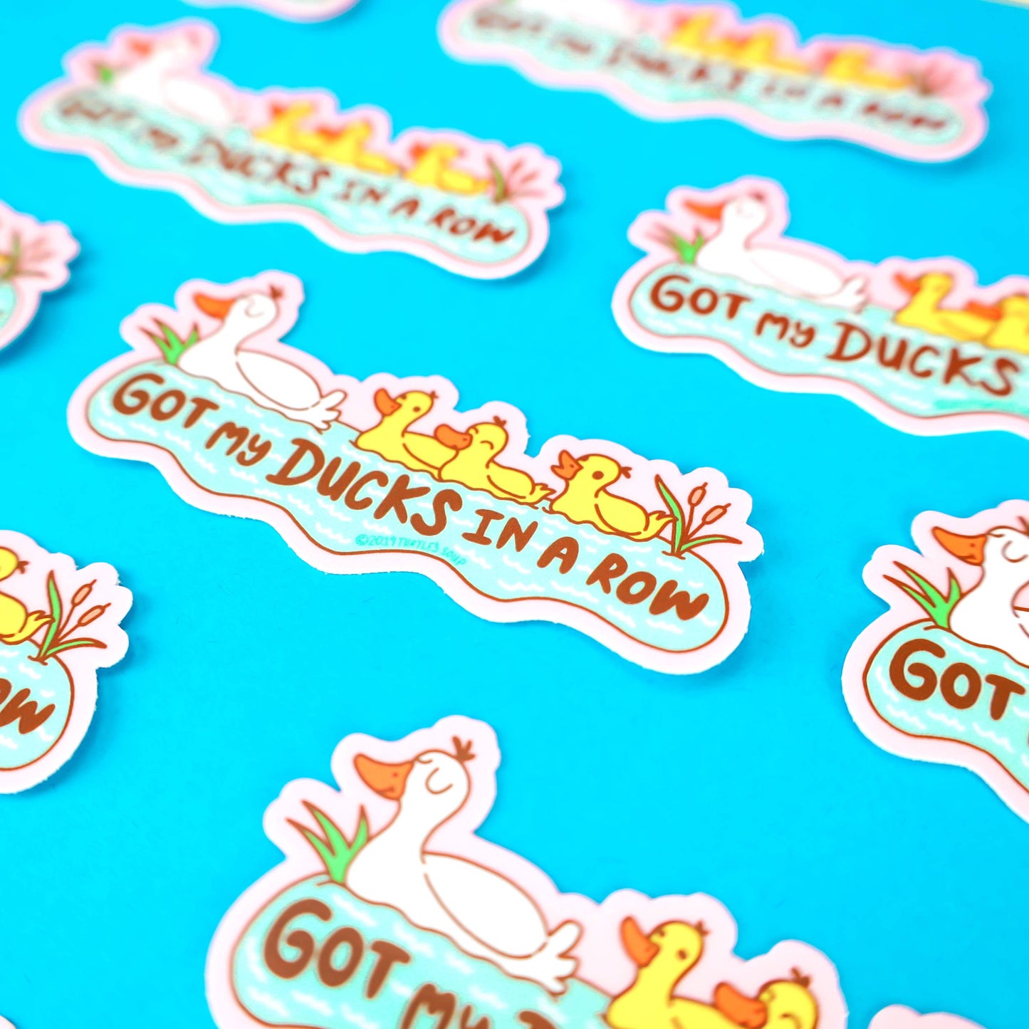 Ducks in a Row Sticker