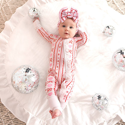 Hallie Ruffle Zip
