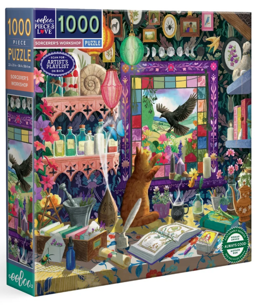 A 1000-piece jigsaw puzzle box by Socees Workshop, featuring a highly detailed, colorful illustration of a cozy, cluttered artist studio filled with bottles, flowers, books, and a bear gazing out a stained-glass window.